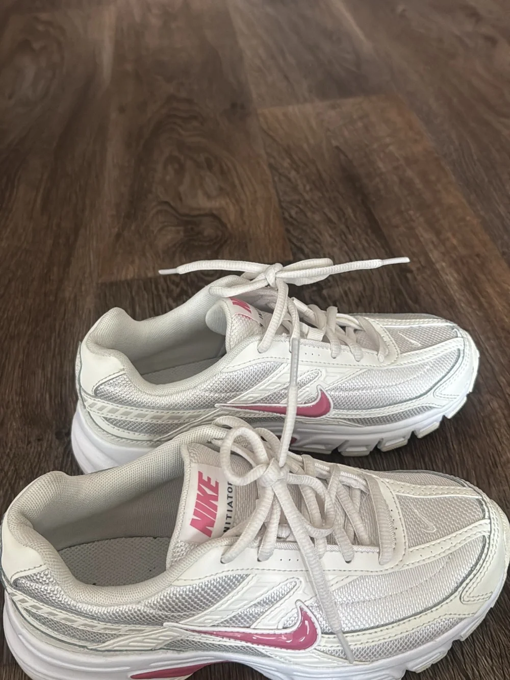 Nike Women’s White Sneakers with Pink Swoosh